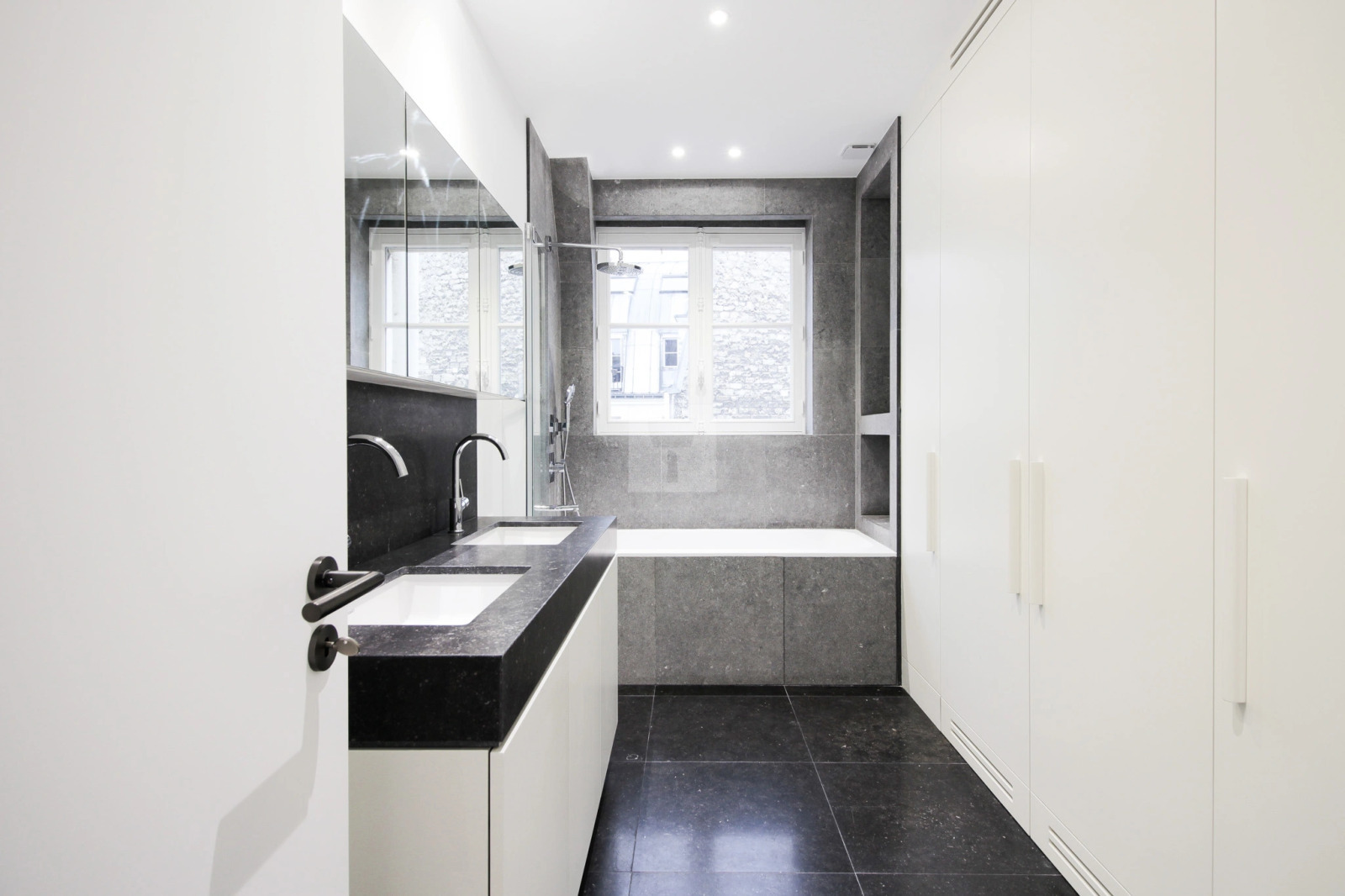 Bathroom bluestone, floor, wall, bath and countertop