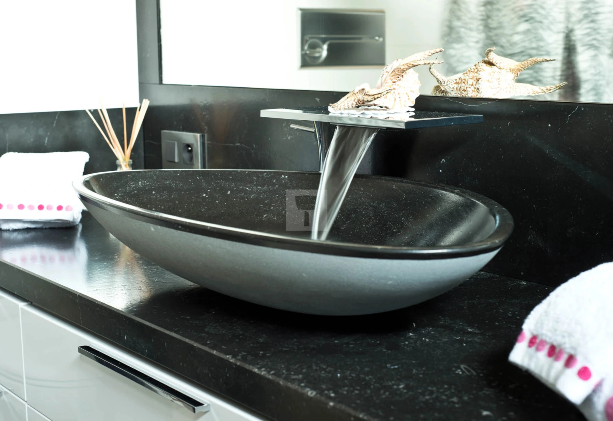 An elegant bluestone sink and countertop